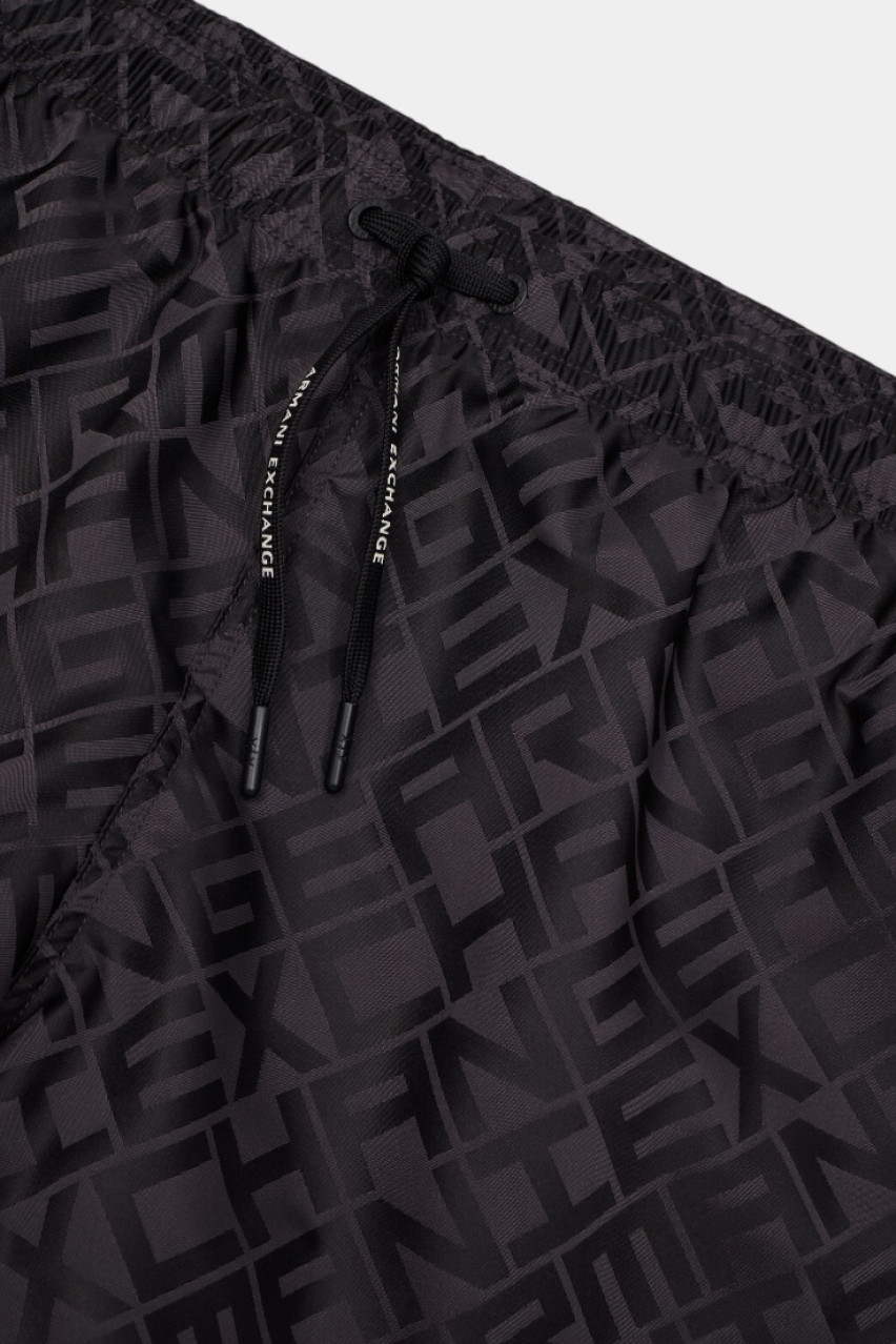 Чорні плавки з патерновим логотипом по всій поверхні XM000829 AF13629 FC013 Armani Exchange