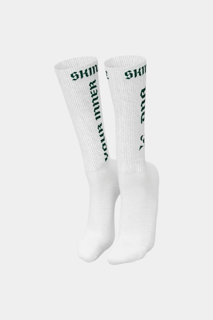 Білі шкарпетки Stacks із зеленими надписами SKINZ