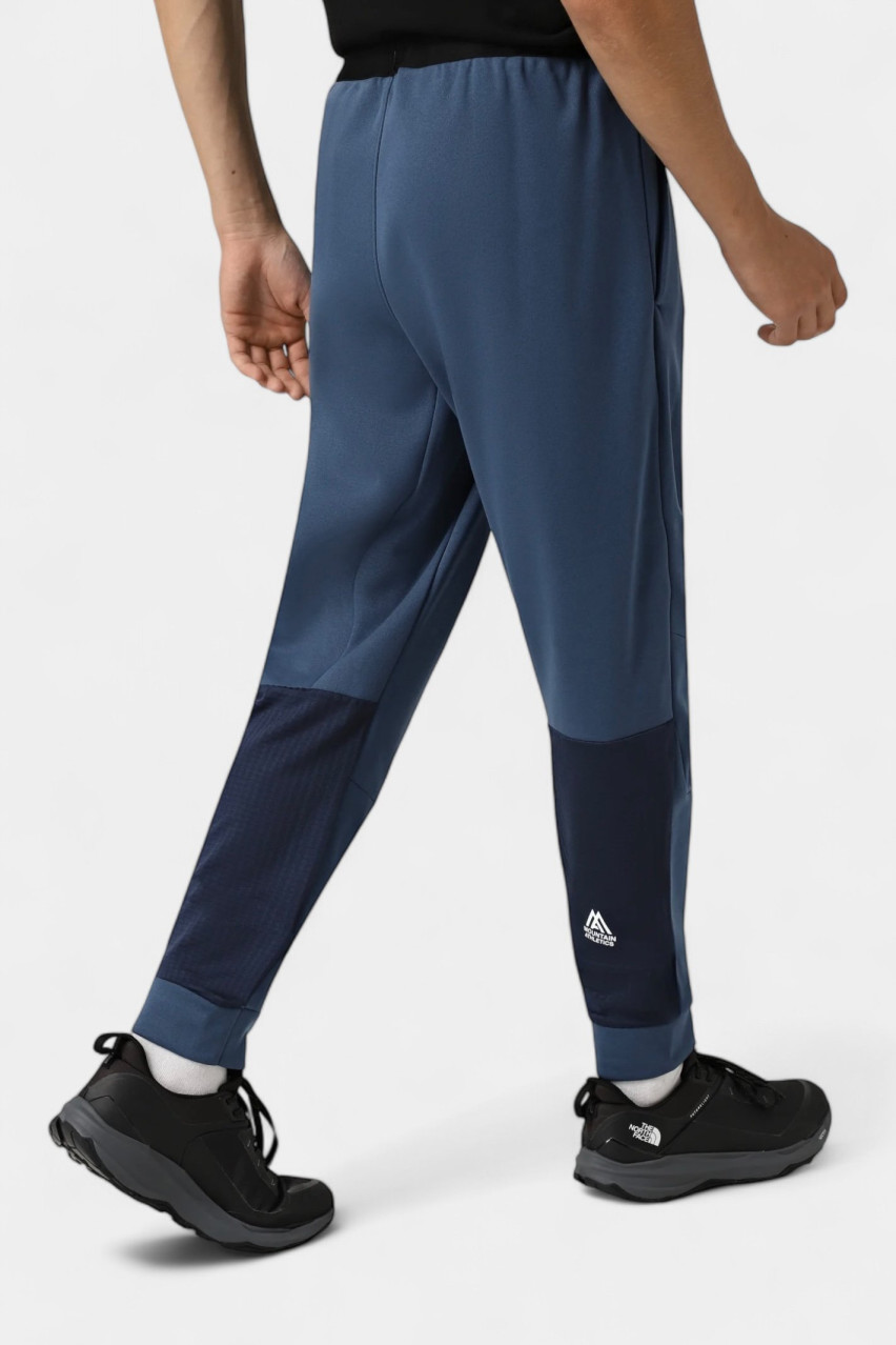 Синие спортивные штаны Mountain Athletics Fleece Pant NF0A893S9261 The North Face